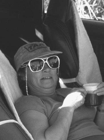 A rare picture of Elaine Turner – “resting” with a cup of tea on a long and exhausting interstate drive in 1981