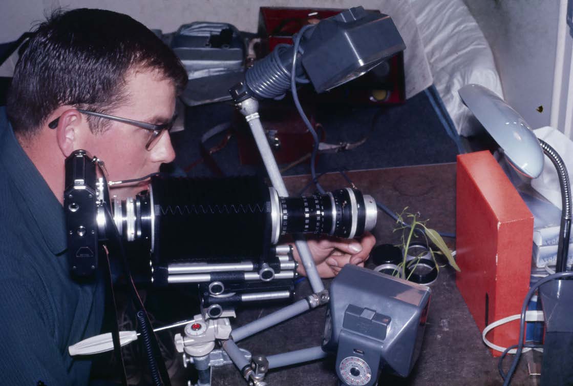 Gunther Schmida photographing in his home studio, late 1960s