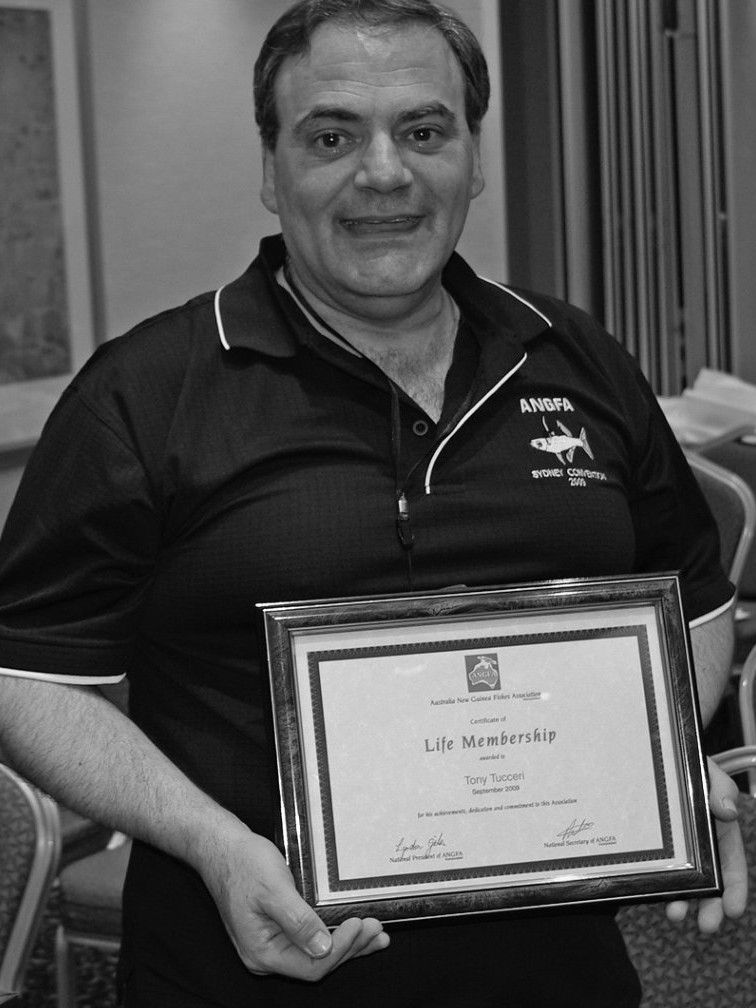 Tony Tucceri displaying his ANGFA Life Membership certificate, 2009
