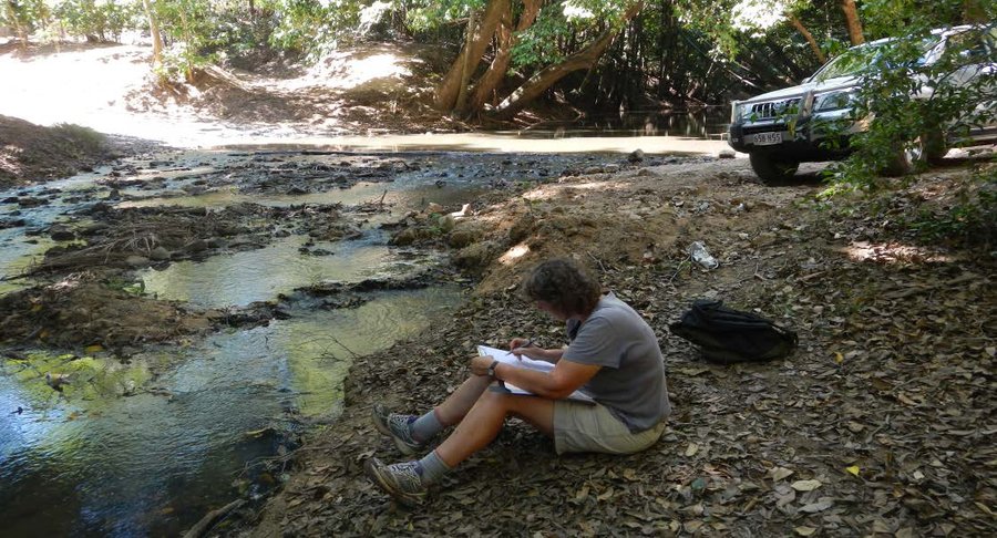 Sue Barclay writing up field notes at Morgan River