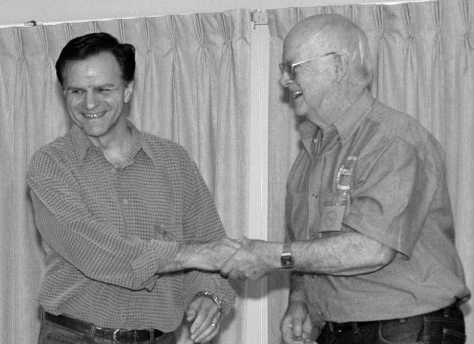 A framed print presentation to one of the convention's long-term supporters