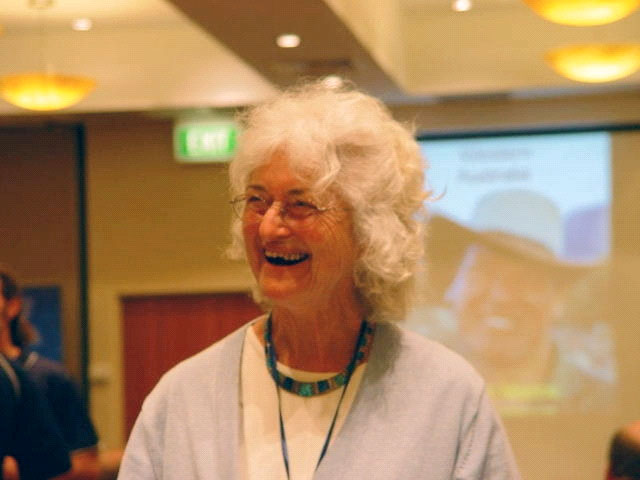 Jean Joss smiling during her lungfish presentation