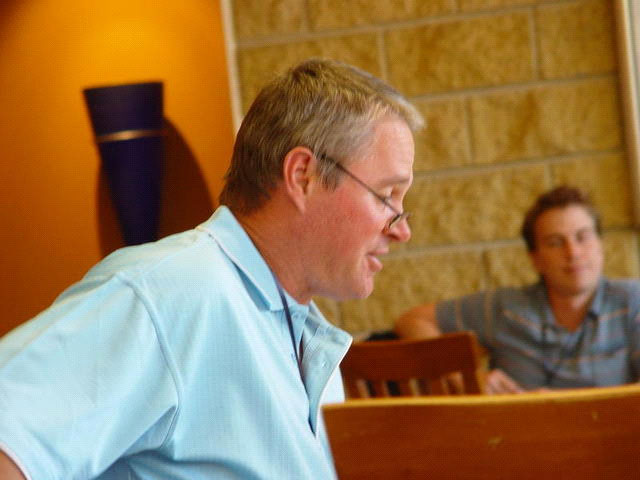 Michael Cocks seated at the convention