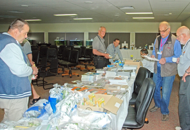 Delegates browsing the trade table at the convention
