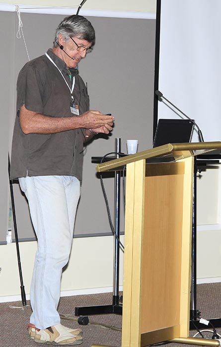 Brian Andrews speaking at the podium